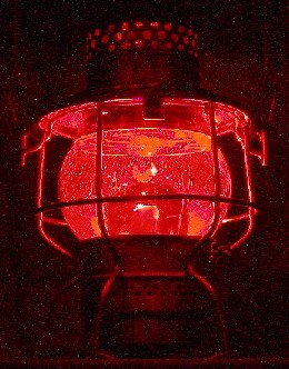 Illuminated red globe lantern